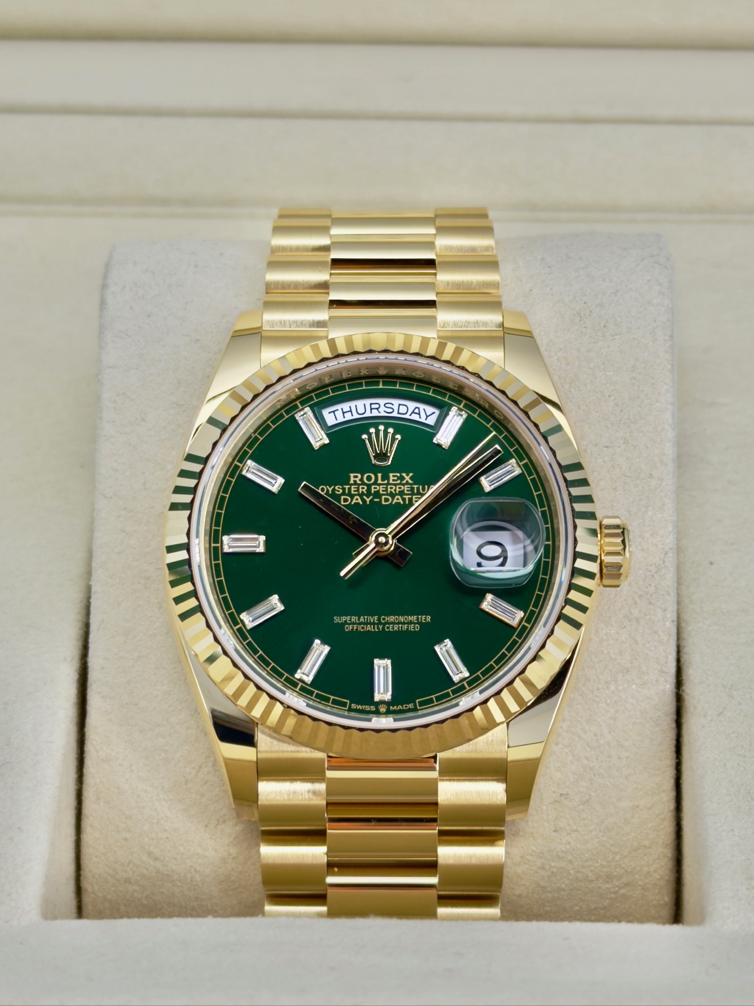 Front Face Pre-Owned Rolex Day-Date Green Baguette 128238 Box and Papers