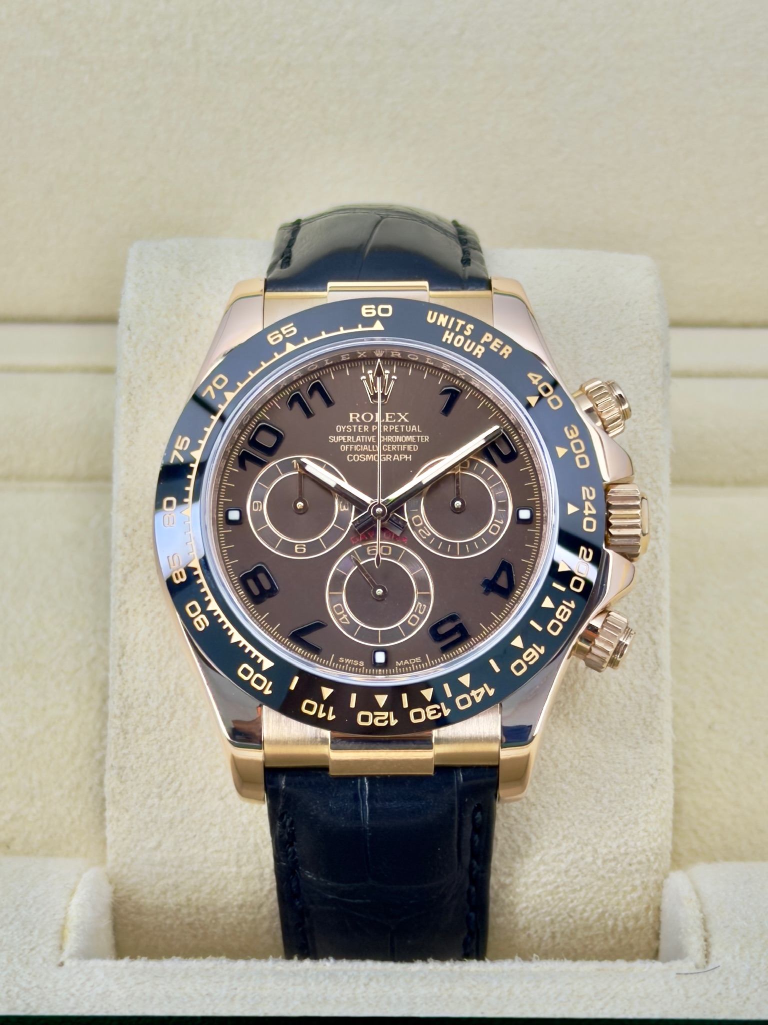Front Face Pre-Owned Rolex Chocolate Arabic Daytona 116515 Box and Papers