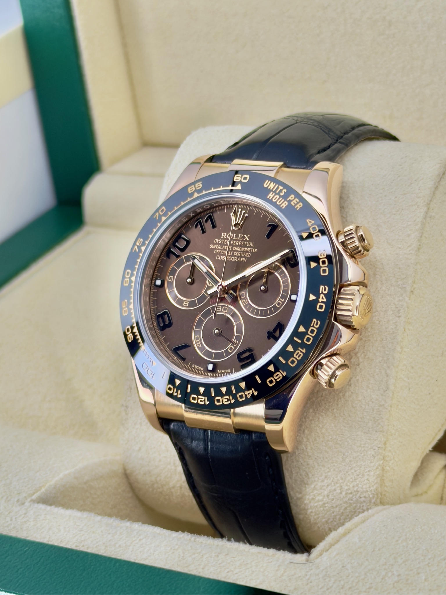 Side Face Pre-Owned Rolex Chocolate Arabic Daytona 116515 Box and Papers