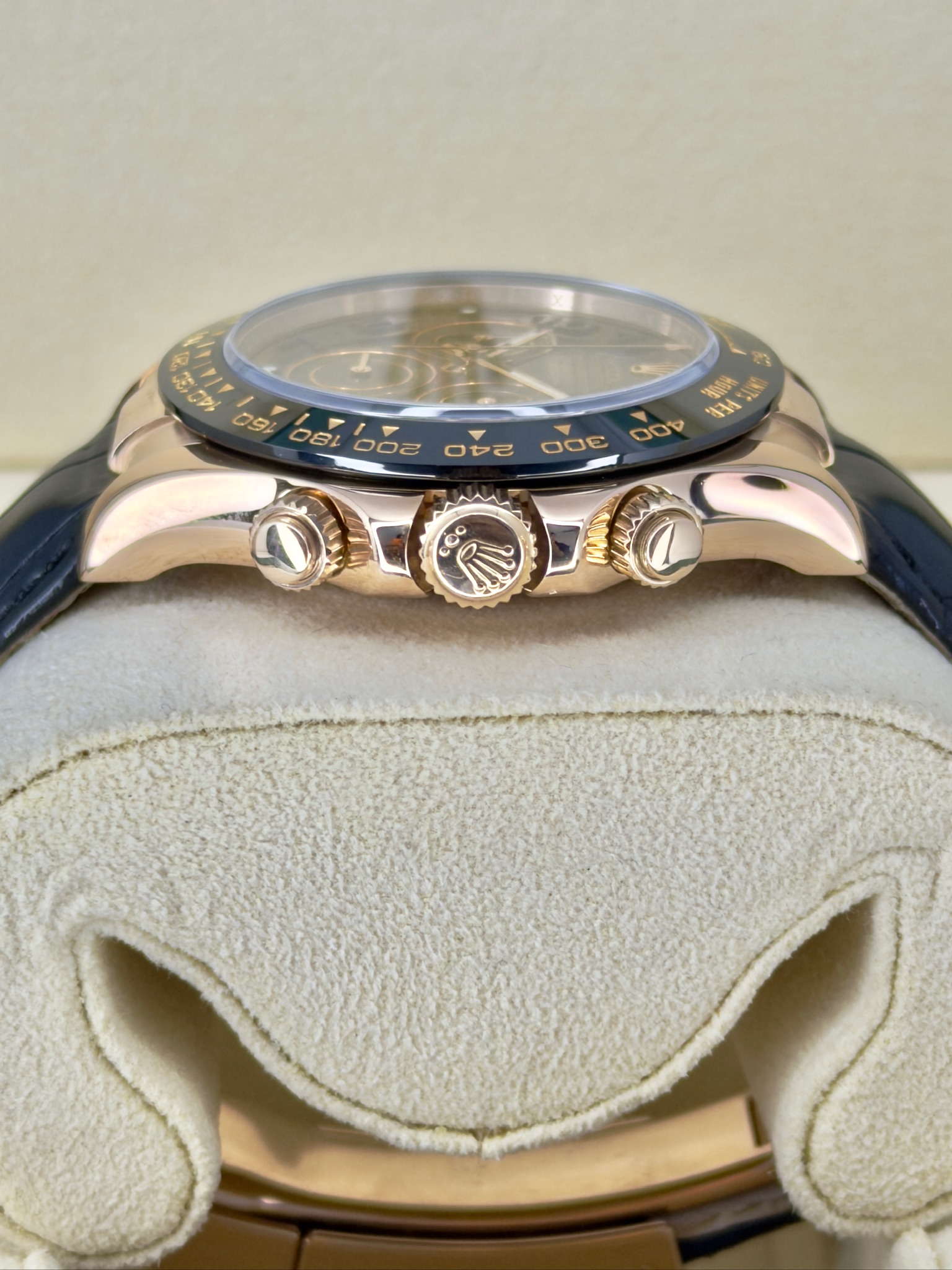 Side Shot Pre-Owned Rolex Chocolate Arabic Daytona 116515 Box and Papers