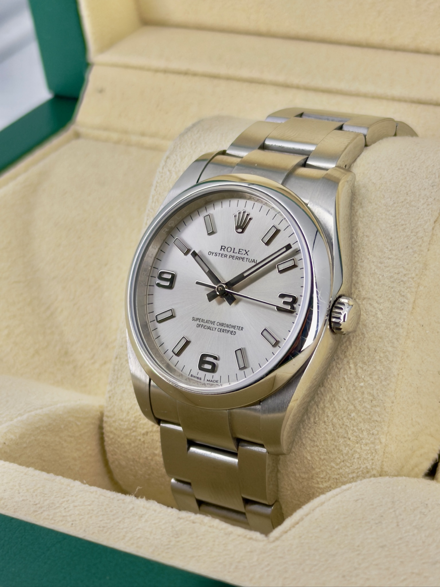 Side Face Pre-Owned Rolex Oyster Perpetual 114200 Watch and Box