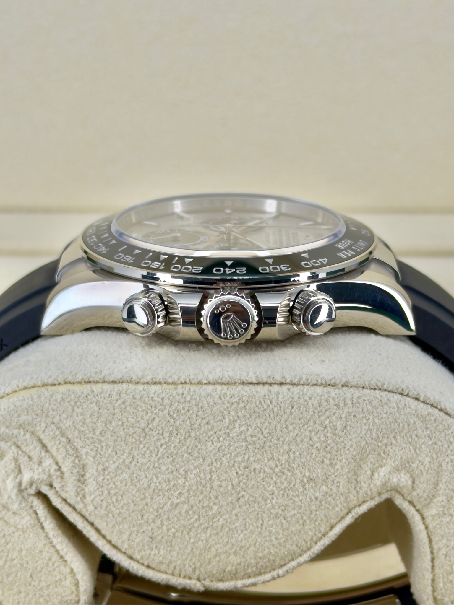 Side Shot Pre-Owned Rolex Daytona Ghost 126519 Box and Papers