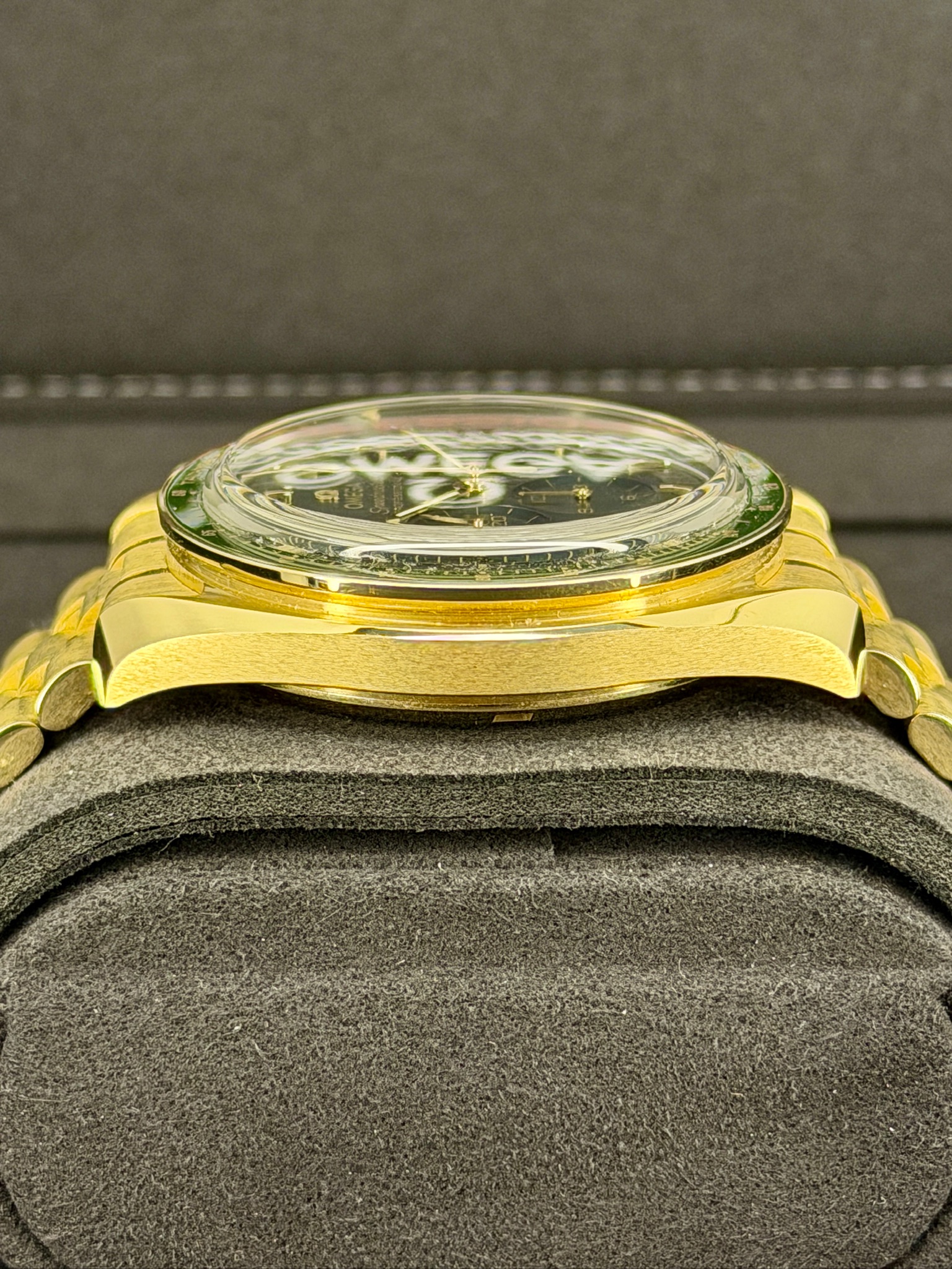 Side Shot 2 Pre-Owned Omega Speedmaster Moonshine Gold box and papers