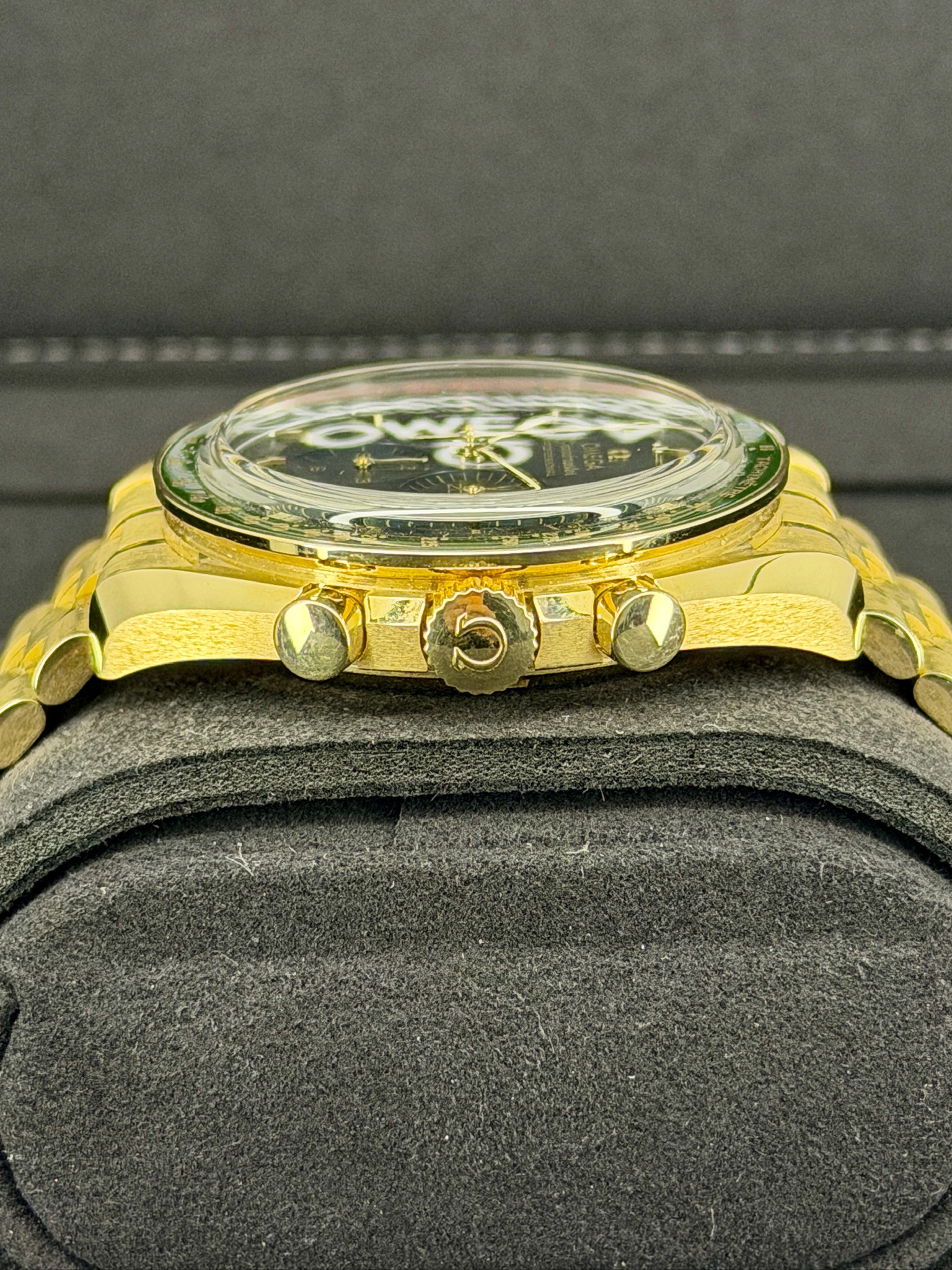 Side Shot Pre-Owned Omega Speedmaster Moonshine Gold box and papers